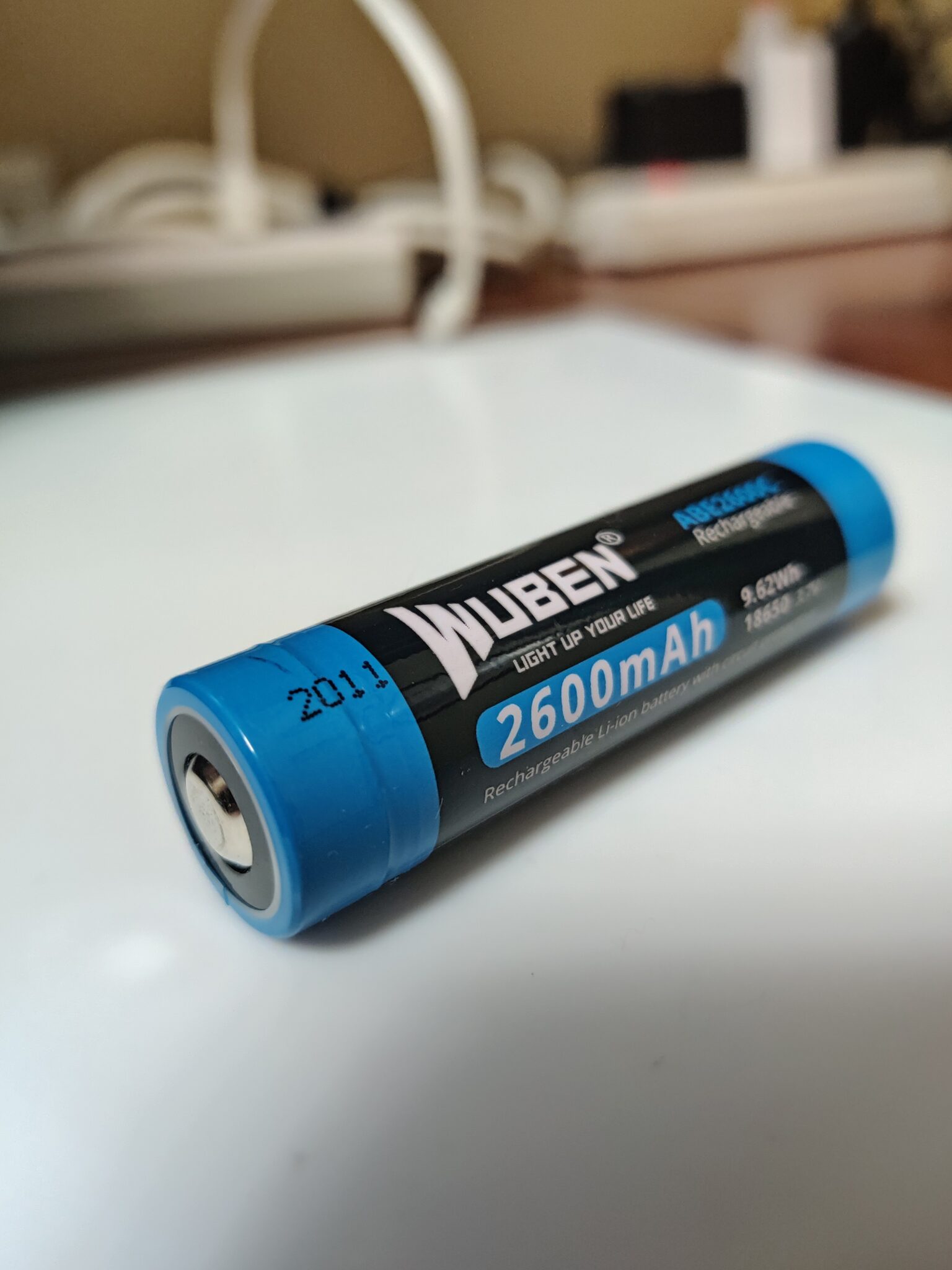 Wuben 18650 Rechargeable Battery – 2600Mah Button Top Protected Li Ion Cell For Flashlights Gimbals Solar Lights Scaled Looking For A Reliable And Long-Lasting 18650 Battery? The Wuben 2600Mah 18650 Battery Is A Top-Tier Option Trusted In High-End Flashlights And Outdoor Gear. Designed With Safety, Compatibility, And Performance In Mind, This Battery Is Perfect For Flashlights, Gimbals, Solar Lights, Rechargeable Fans, And Other Electronics That Need Consistent, Protected Power.