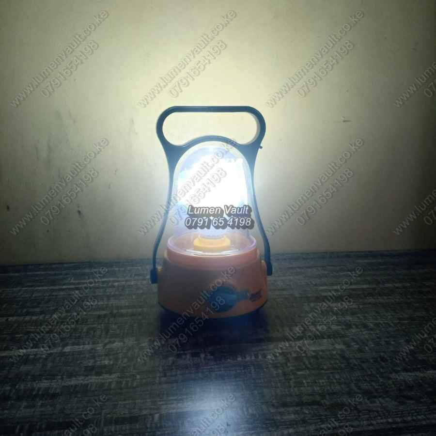 949 The AKKO HK-260B Rechargeable Emergency Lamp offers a dependable lighting solution, perfect for homes and various uses across Kenya. This efficient lamp provides an impressive 24 hours of continuous illumination on a single charge. It features a long-life LED light shade that effectively brightens an entire room and includes a 6V built-in rechargeable battery that is replaceable. For safety and convenience, it has overcharge protection and will automatically light up during a power outage when connected to power.