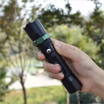 Zoomable LED flashlight with 2000mAh battery for police patrols in Nairobi, Kenya, offering strong light mode for nighttime security.