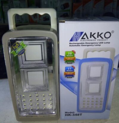 AKKO HK-348T LED lamp lighting up a home in Kenya during power outage, offering 15 hours of reliable brightness.