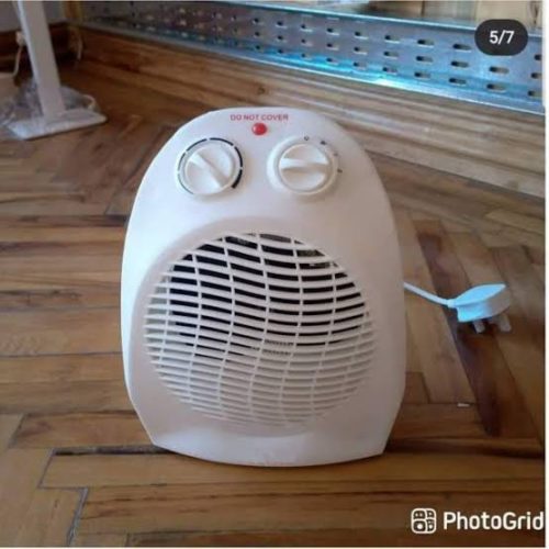 2000W Heater for Nairobi Homes Portable 2000W fan heater warming a Nairobi living room, with adjustable thermostat for custom temperature control.