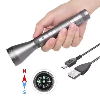PEETPEN L40 flashlight casting 900 lumens beam for campsite illumination during Kenyan night hikes.