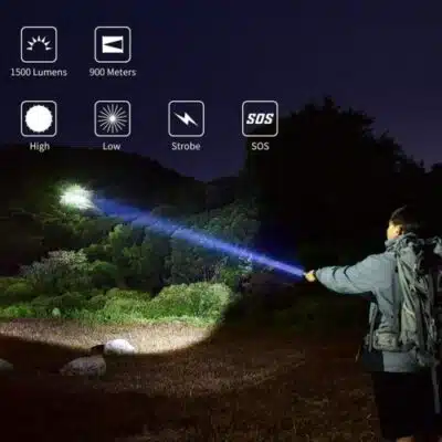 PEETPEN L80 flashlight illuminating a camping trail, showcasing 1500 lumens for nighttime adventures in the wilderness.