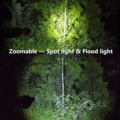 PEETPEN C60 LED flashlight brightening a campsite with 1000 Lumens zoom, ideal for nighttime camping adventures.