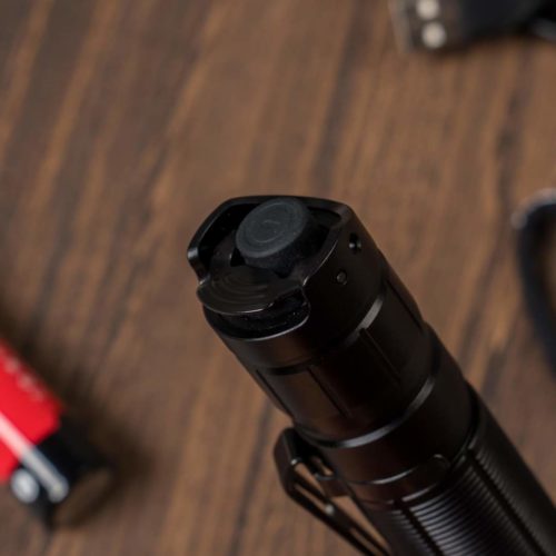 Klarus XT11R Hiking Beam Power Klarus XT11R 1300LM flashlight illuminating campsite in Kenya for night hiking adventures.