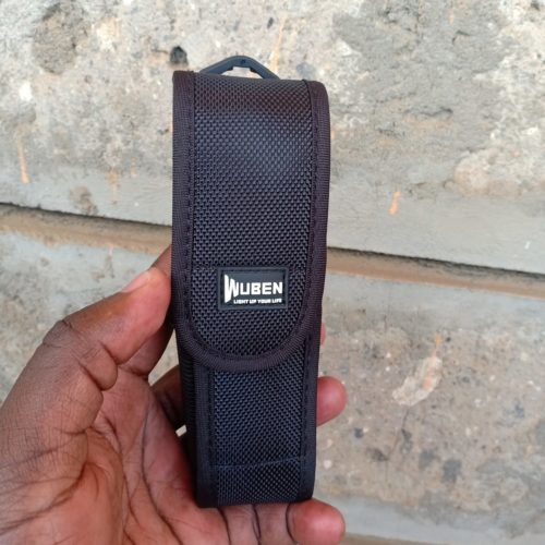 WUBEN AS6 Holster for Camping Gear WUBEN AS6 nylon holster securely holding flashlight for camping hikes, with adjustable length for easy fit.