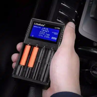 LiitoKala Lii-PD4 smart charger displaying LCD progress for 18650 batteries in home emergency kits.