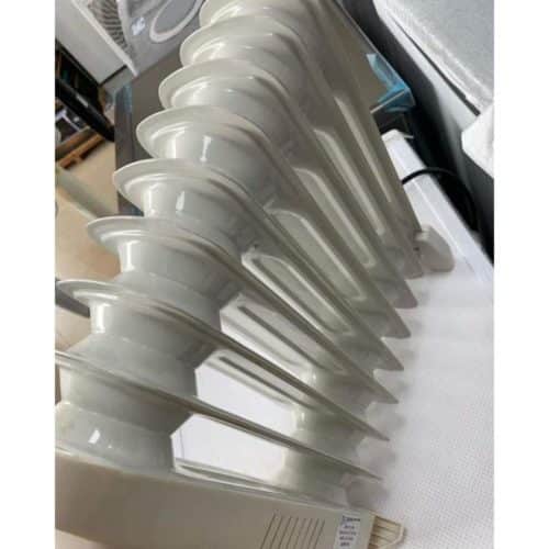 ESTIA Oil Radiator for Nairobi Living Rooms 1000W oil filled radiator warming a cozy home office in Nairobi, Kenya, with quick heat distribution for efficient work sessions.