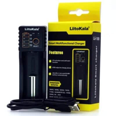 Portable LiitoKala Lii-100 USB charger for 18650 batteries during Nairobi hiking trips, with 1000mAh output.
