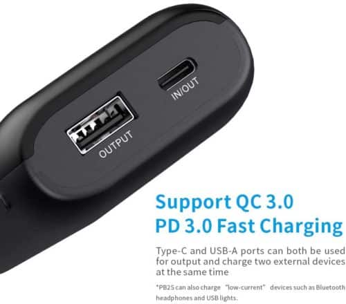 XTAR PB2S Hiking Charger XTAR PB2S power bank fast-charging a phone during outdoor hiking in Kenya.