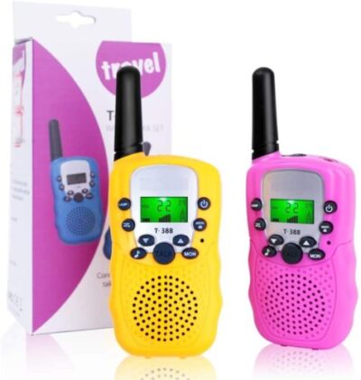 Kids T-388 walkie talkie in action for park hide-and-seek games, with 6 KM range for safe exploration in Nairobi.