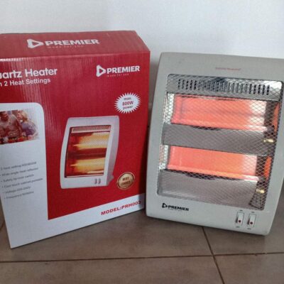 Premier 400W quartz heater warming a cozy living room in Nairobi, Kenya, with rapid halogen heating for energy-efficient comfort.