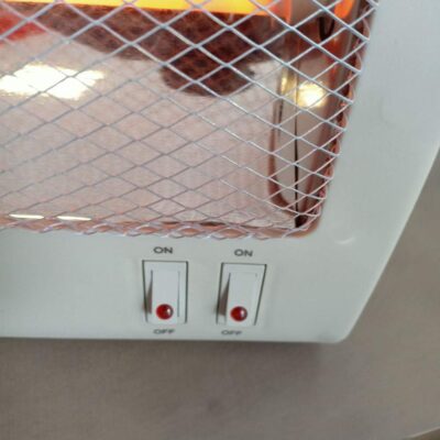 Efficient Premier quartz heater warming an office in Nairobi with 800W for quick, energy-saving heat.