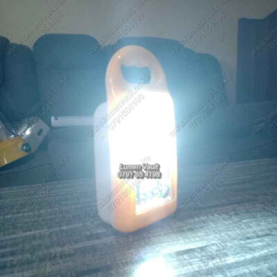 HAKKO HK-400B LED lamp lighting up a Kenyan campsite, perfect for overnight adventures with 120-hour runtime.