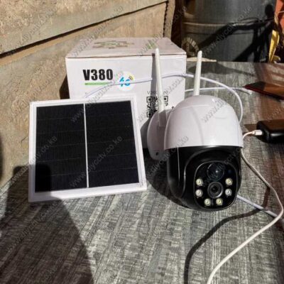 V380 PRO 4G Solar CCTV camera charging via solar panel for farm security in rural Kenya, featuring 28-hour backup.