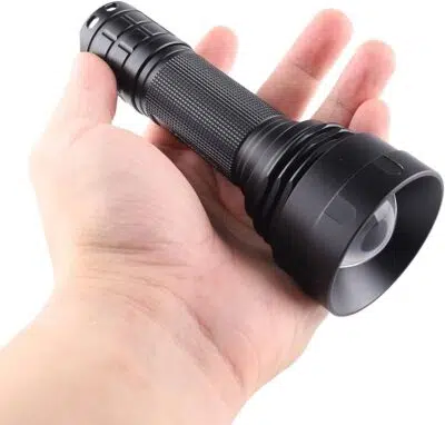 Convoy Z1 2000lm flashlight beaming 800m for search and rescue in dark forests.