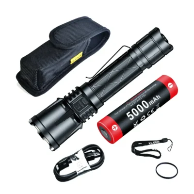 Klarus XT21X Pro flashlight illuminating dark path during security patrol in Kenya.