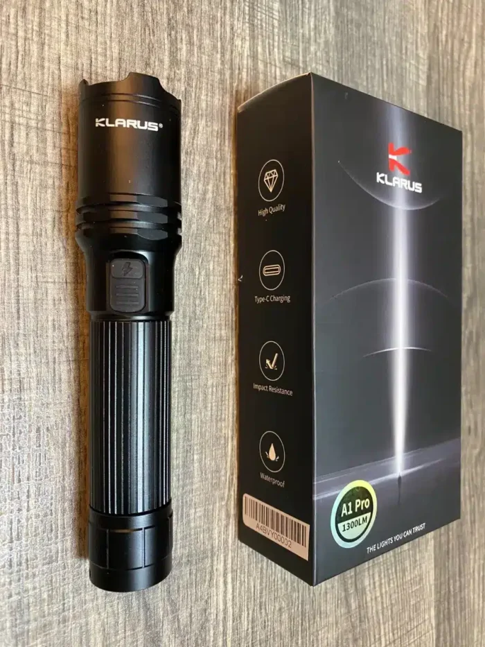 Where to Buy Flashlights in Kenya: Spotlight on Lumen Vault 12 Klarus A1 Pro flashlight with 1300 lumens for camping in Kenyan wilderness, illuminating trails up to 230 meters.