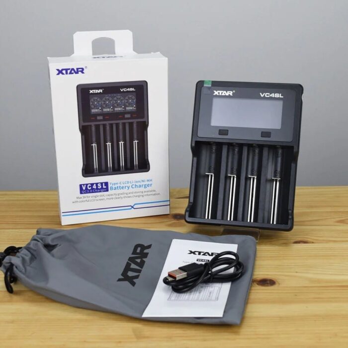 XTAR VC4SL fast charging 18650 batteries for Nairobi flashlight patrols, featuring LCD display and capacity test.