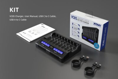 XTAR VC8S 8-slot charger with LCD display testing 18650 batteries for flashlight use in Nairobi outdoor trips