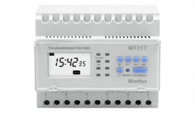 ManHua MT317 3-phase timer switch with backlit LCD for weekly scheduling in industrial settings.
